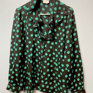 Button up blouse with ruffles along the collar